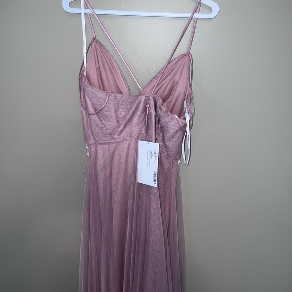 Bought this dress for a wedding a year ago for $200. Never worn. Tag is still on - Picture 3 of 3